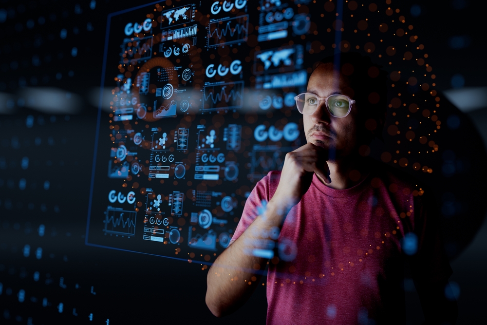 Man evaluating a digital dashboard