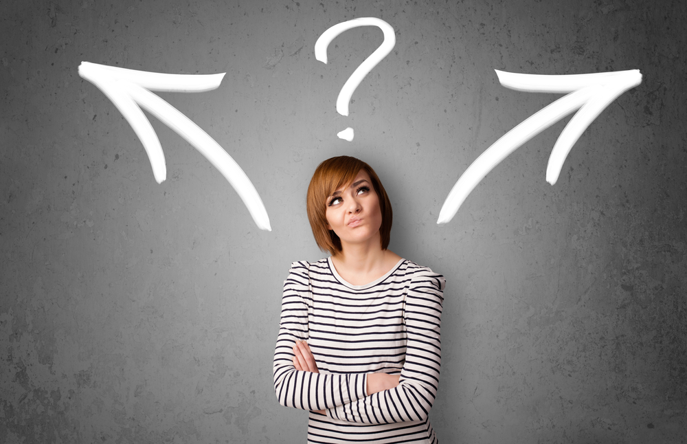 Young woman making a decision. Two arrows leading away from her in the apposite direction with a question mark. It indicates the decision between all-in-one and a la carte marketing solutions